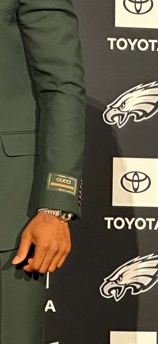 The Gucci label on the suit Jalen Hurts wore to Monday's news conference